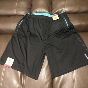 2 brand new Reebok basketball shorts with tags!